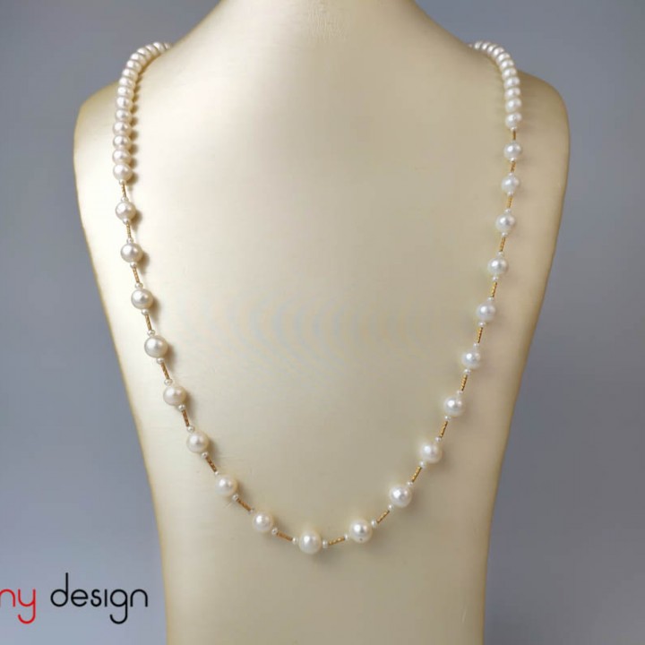 Pearl necklace designed with 18k gold bars 